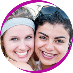Young women smiling wearing braces