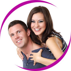 Young couple with healthy teeth smiling