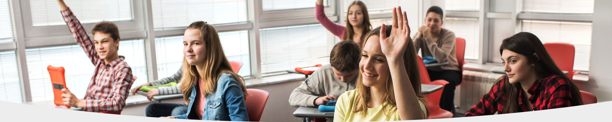 Classroom of children asking questions