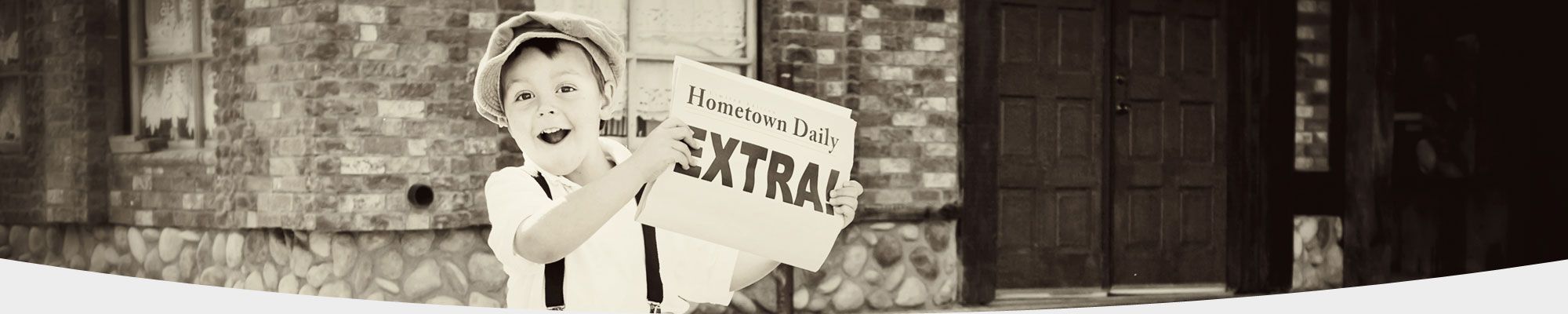 Vintage image of school boy selling newspapers