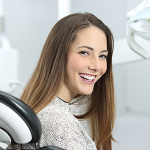 Teenage girl in dentist chair