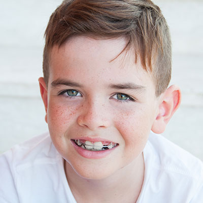 Schoolboy wearing twin-block braces